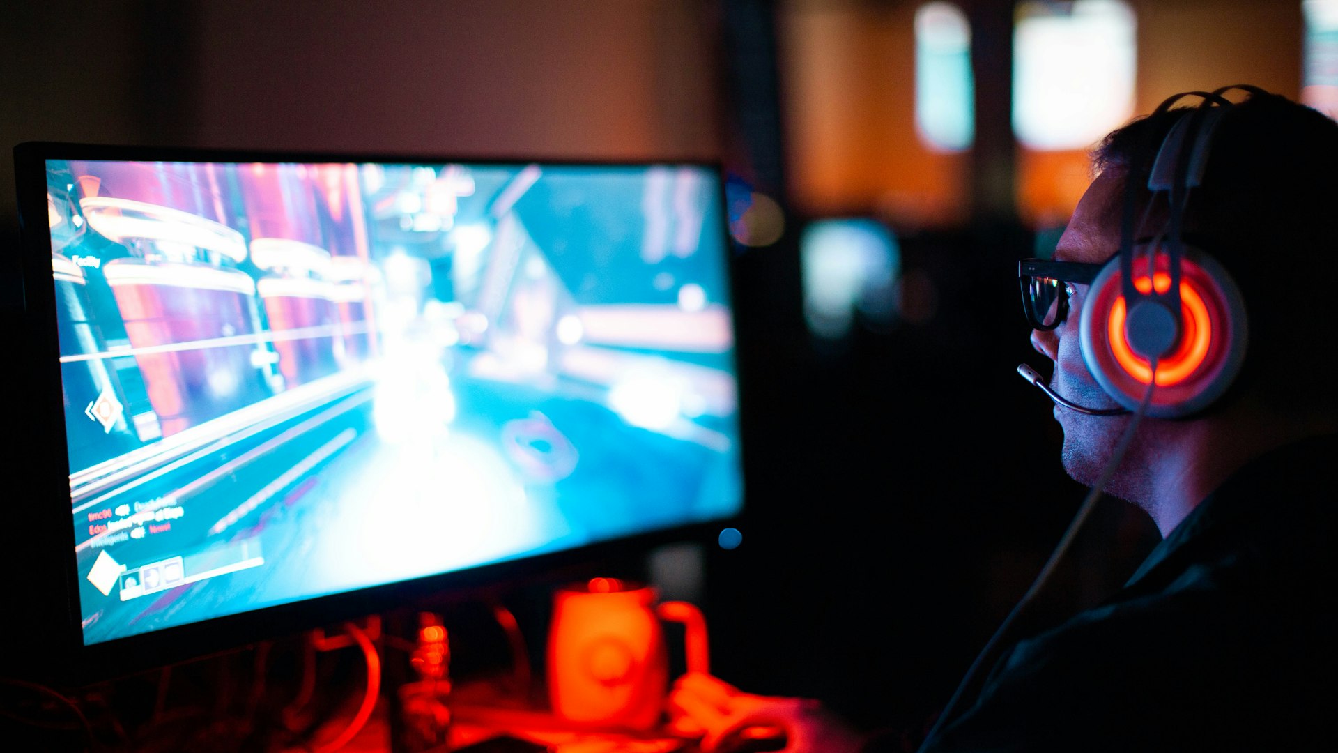 Glowing gaming battlestations inside Quantum Treasure Forge